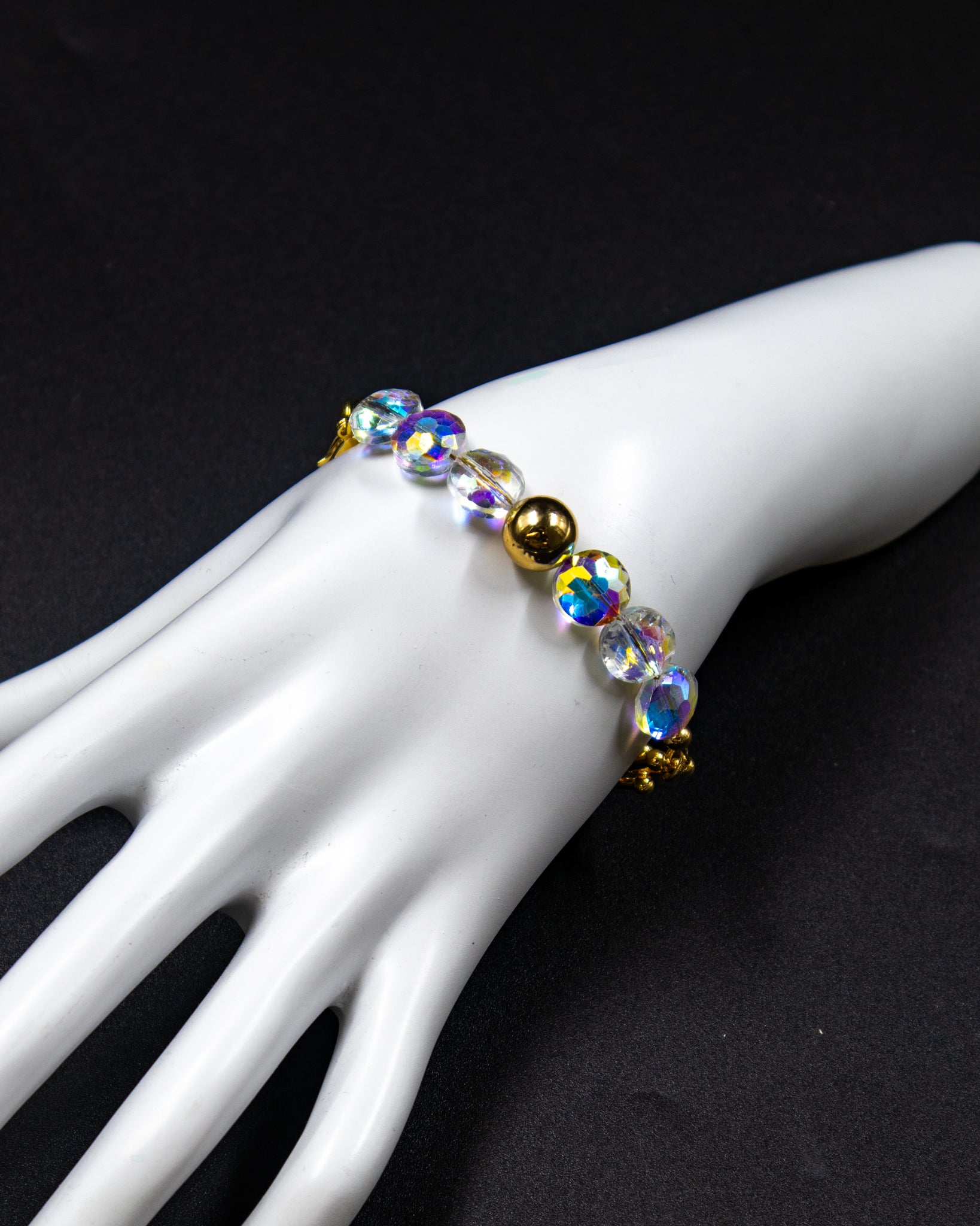 Pulsera con dijes tornasol - M2 Oro Laminado