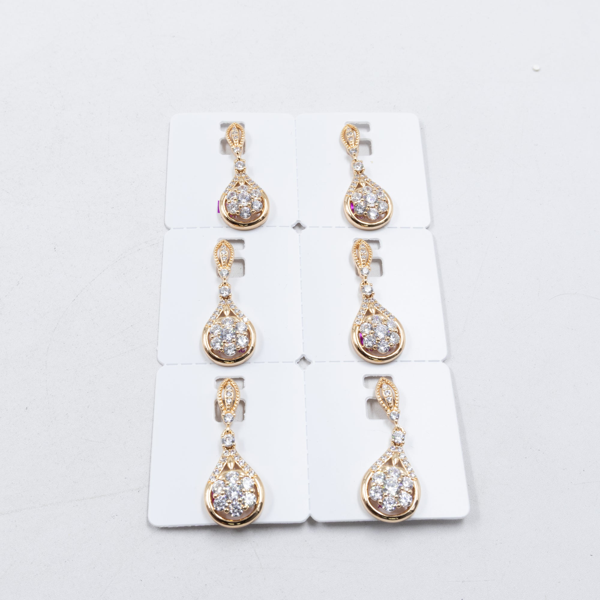 Paquete de 6 dijes con Piedras Oro Rosado  M3 Oro Laminado