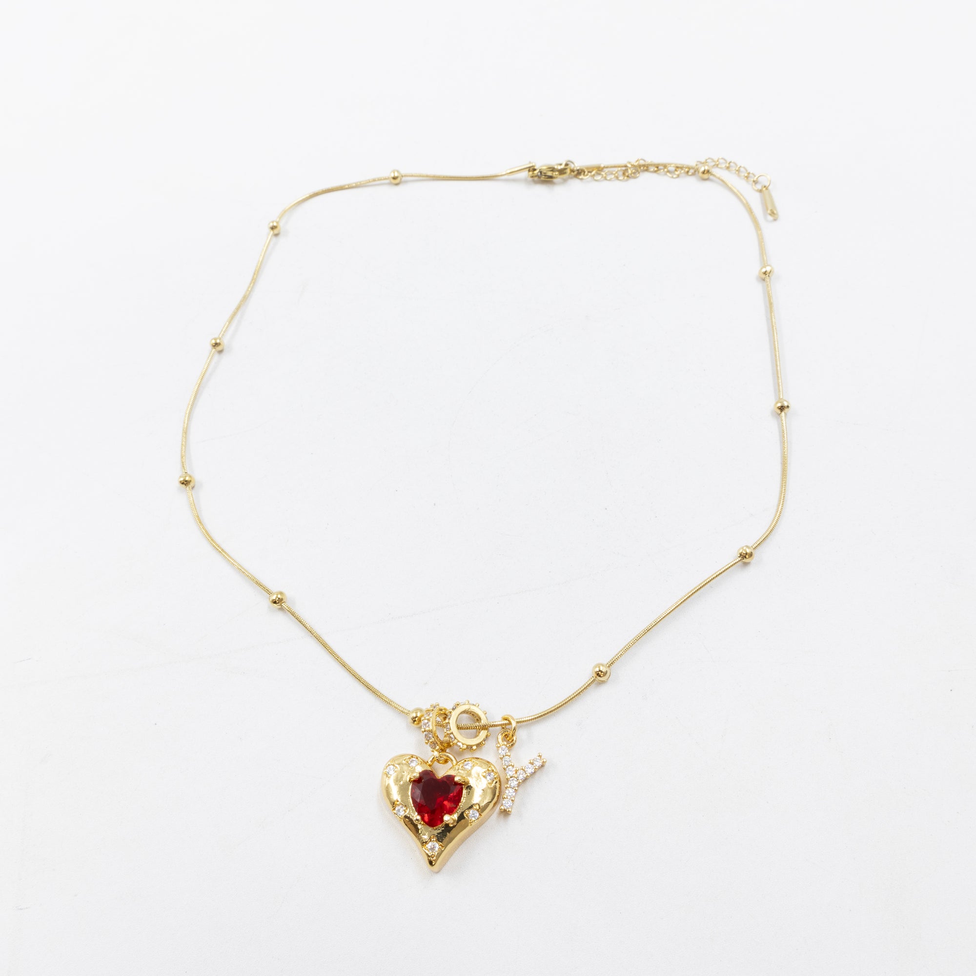 Collares Dorados con dije de Letra y corazón M3 Oro Laminado
