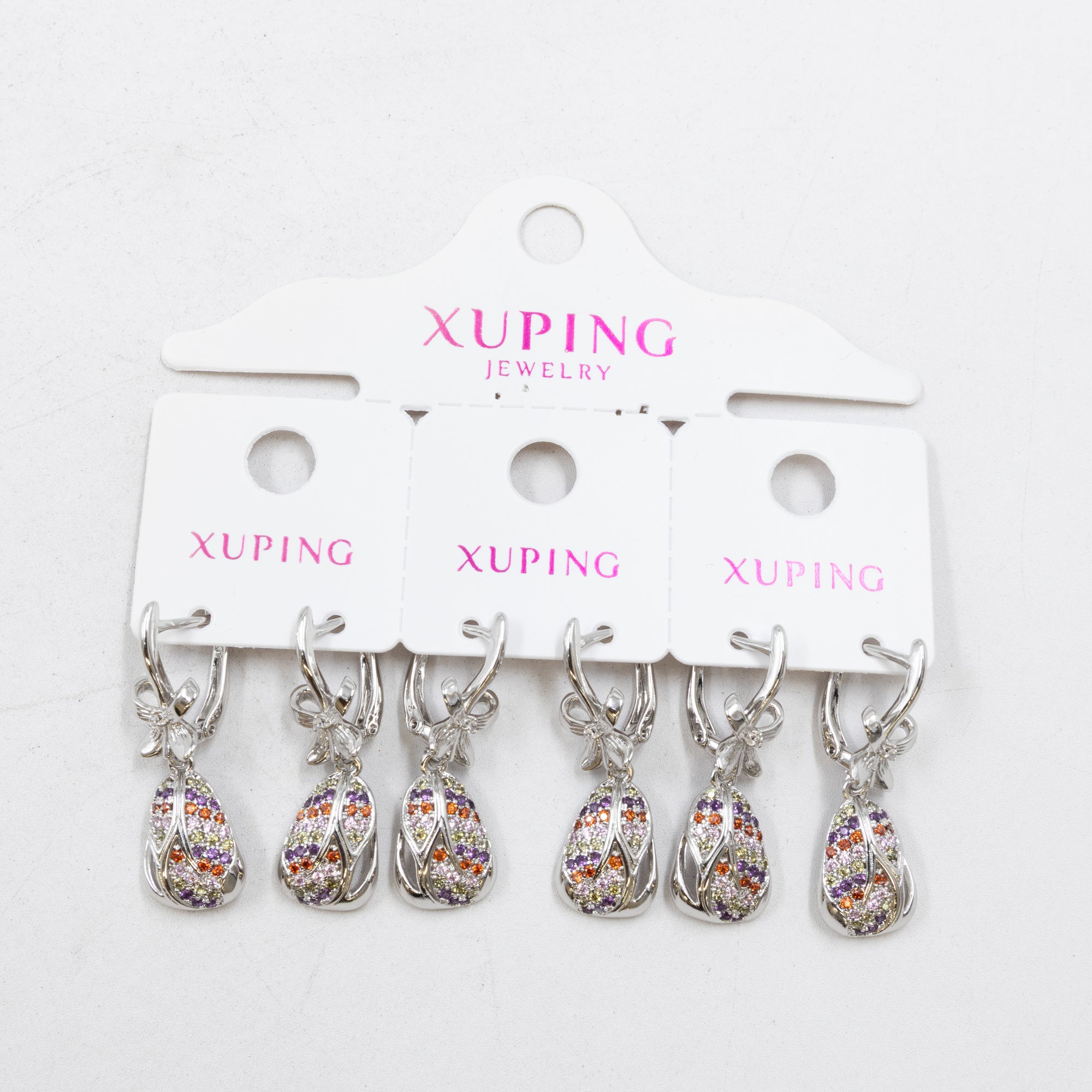 Paquete de tres pares de Aretes Plateados Xuping con piedras M1 Oro Laminado