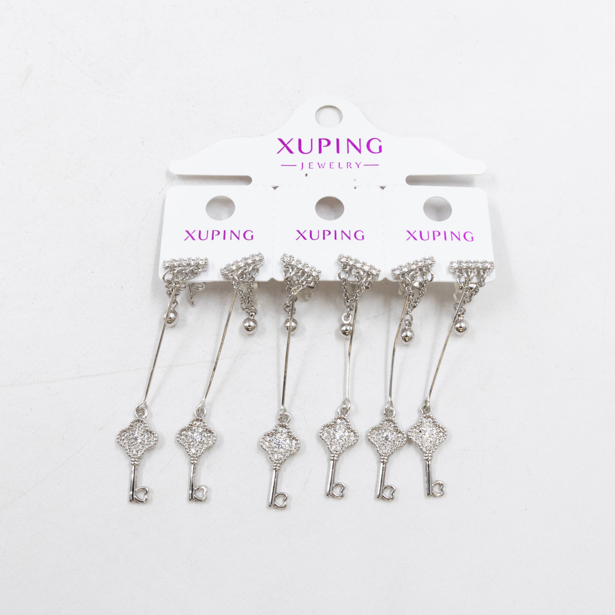 Paquete de tres pares de Aretes Plateados Xuping con piedras M2 Oro Laminado