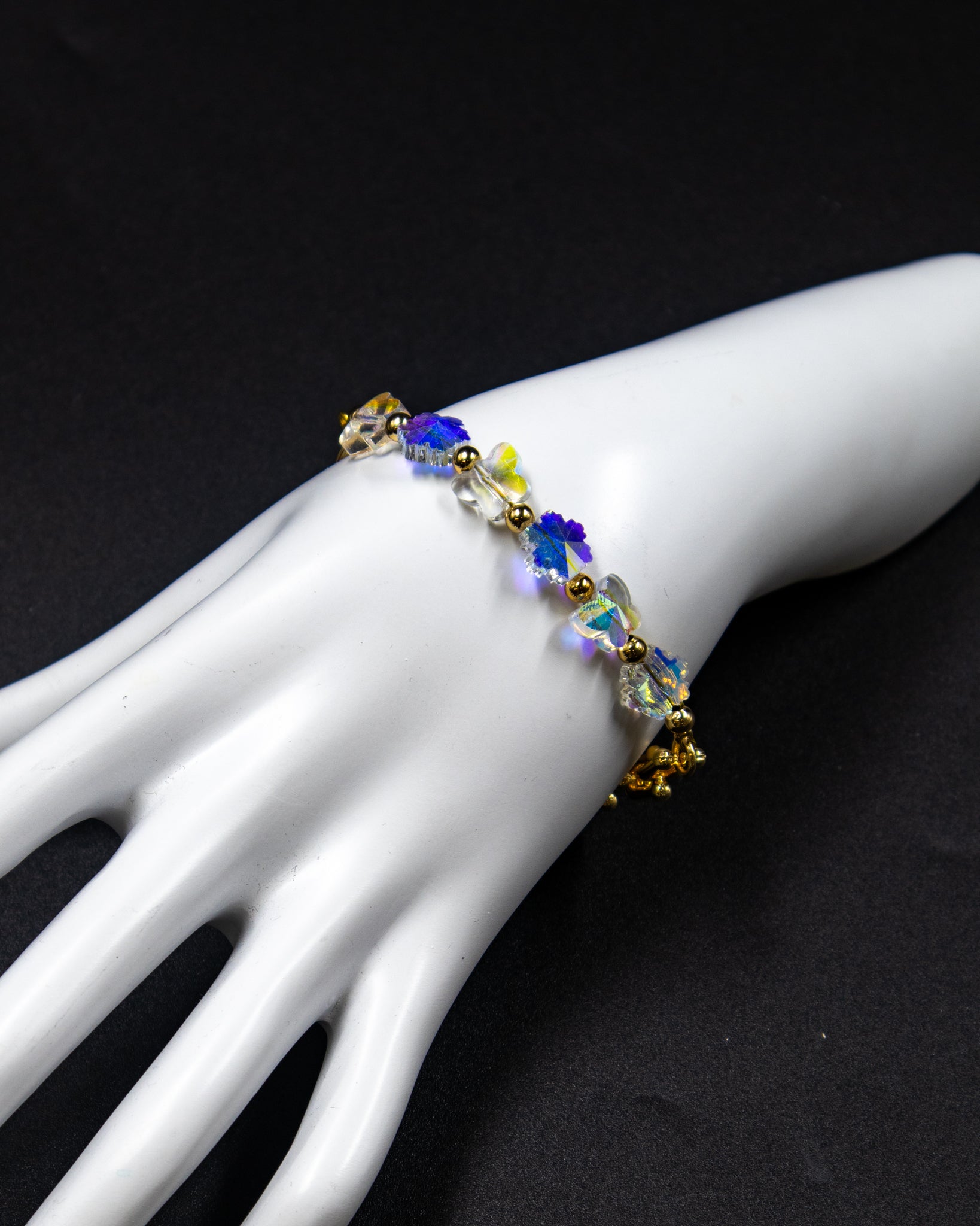 Pulsera con dijes tornasol - M2 Oro Laminado