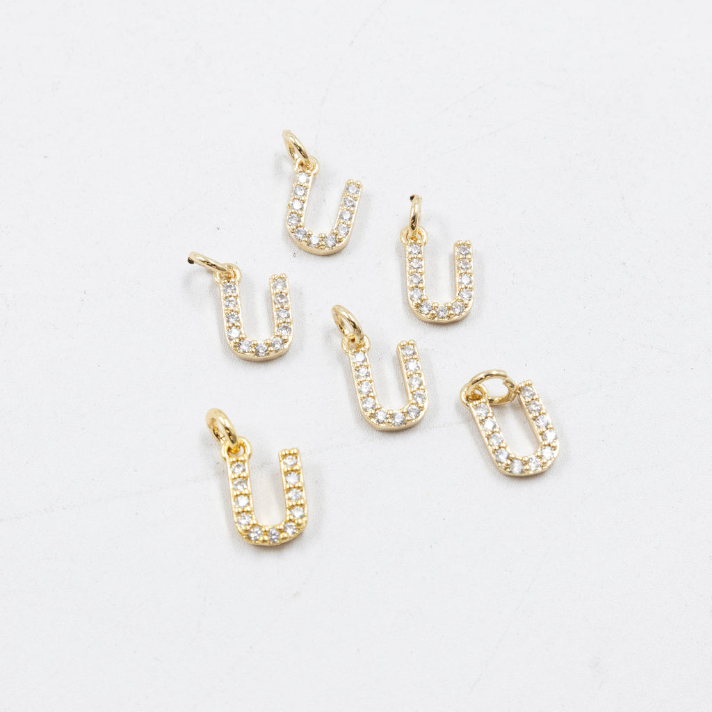 Paquete de 6 Dijes de Letras con piedras M2 Oro Laminado
