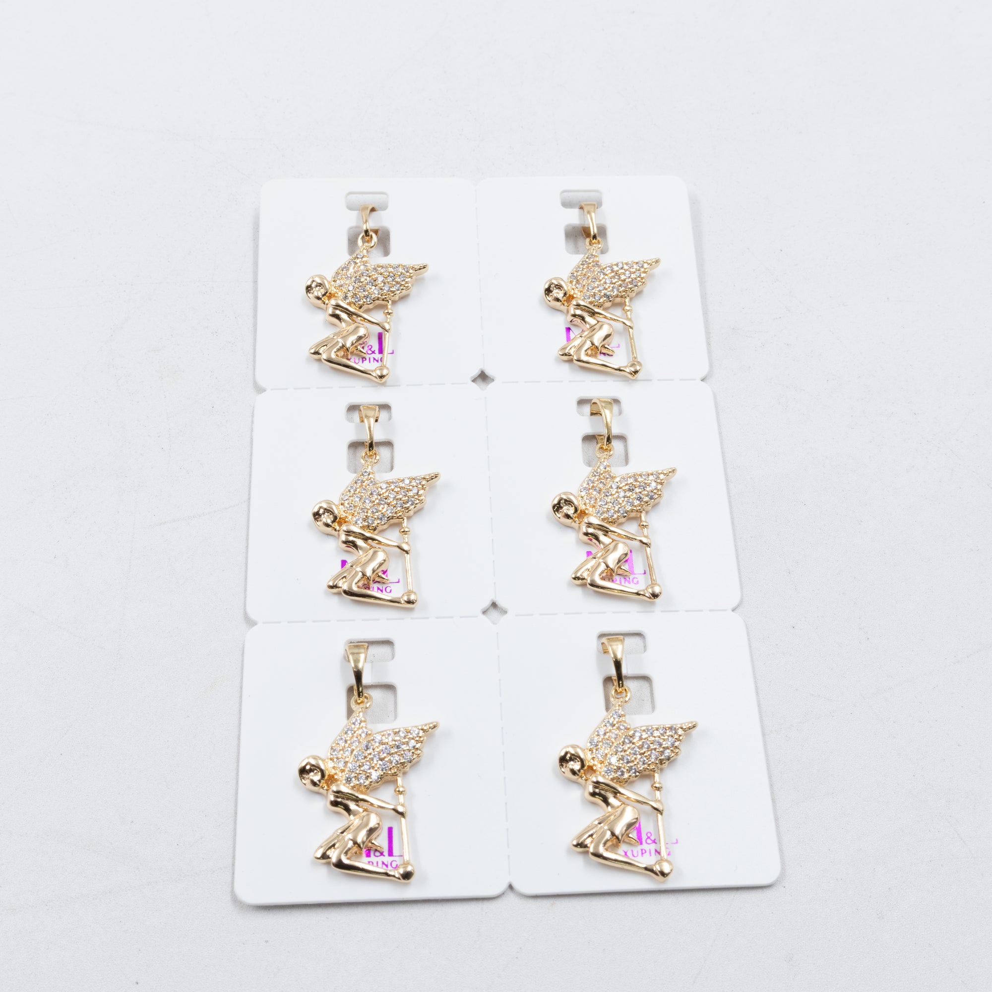 Paquete de 6 dijes con Piedras Oro Rosado  M2 Oro Laminado