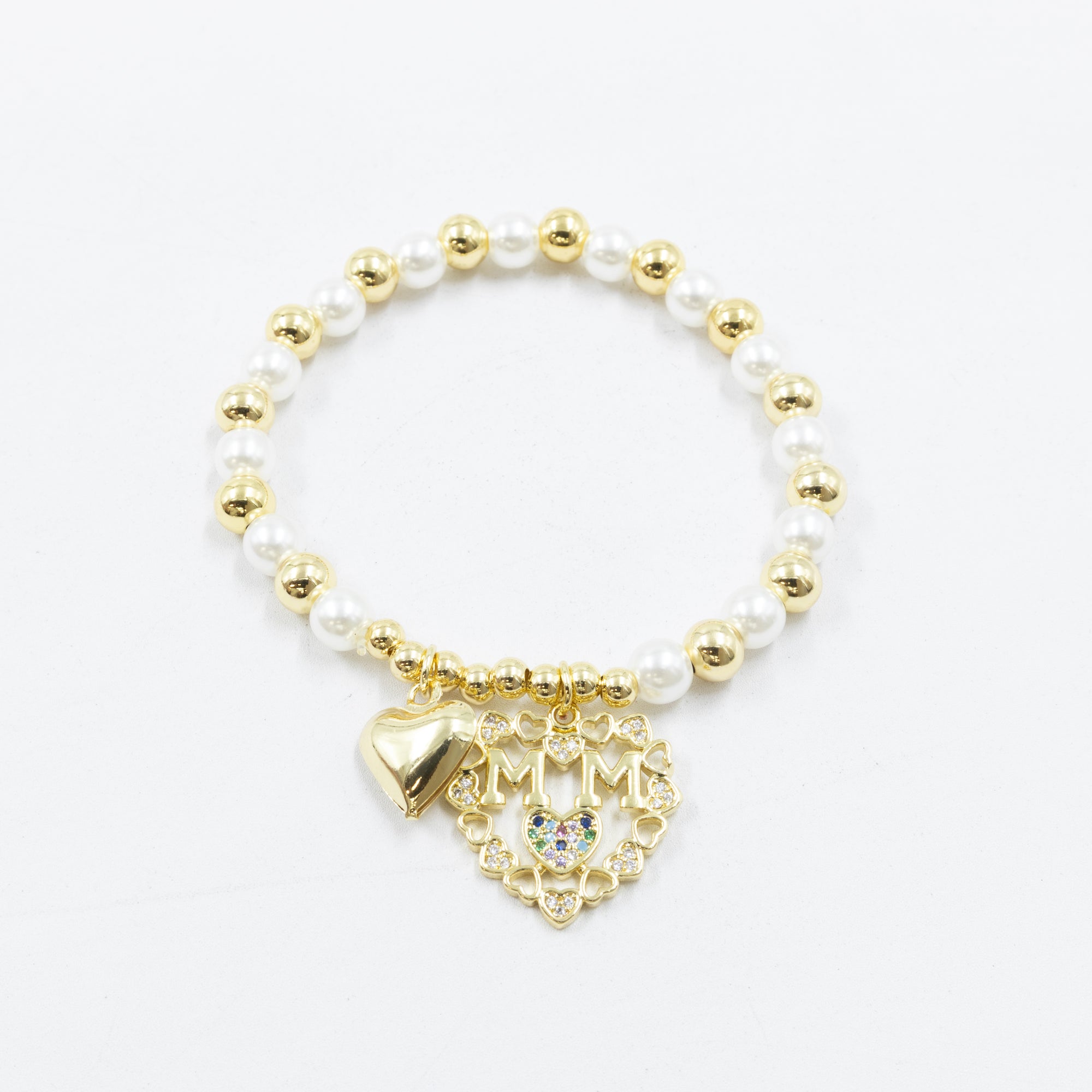 Pulsera con dije de Mamá M6 Oro Laminado 05/03/26