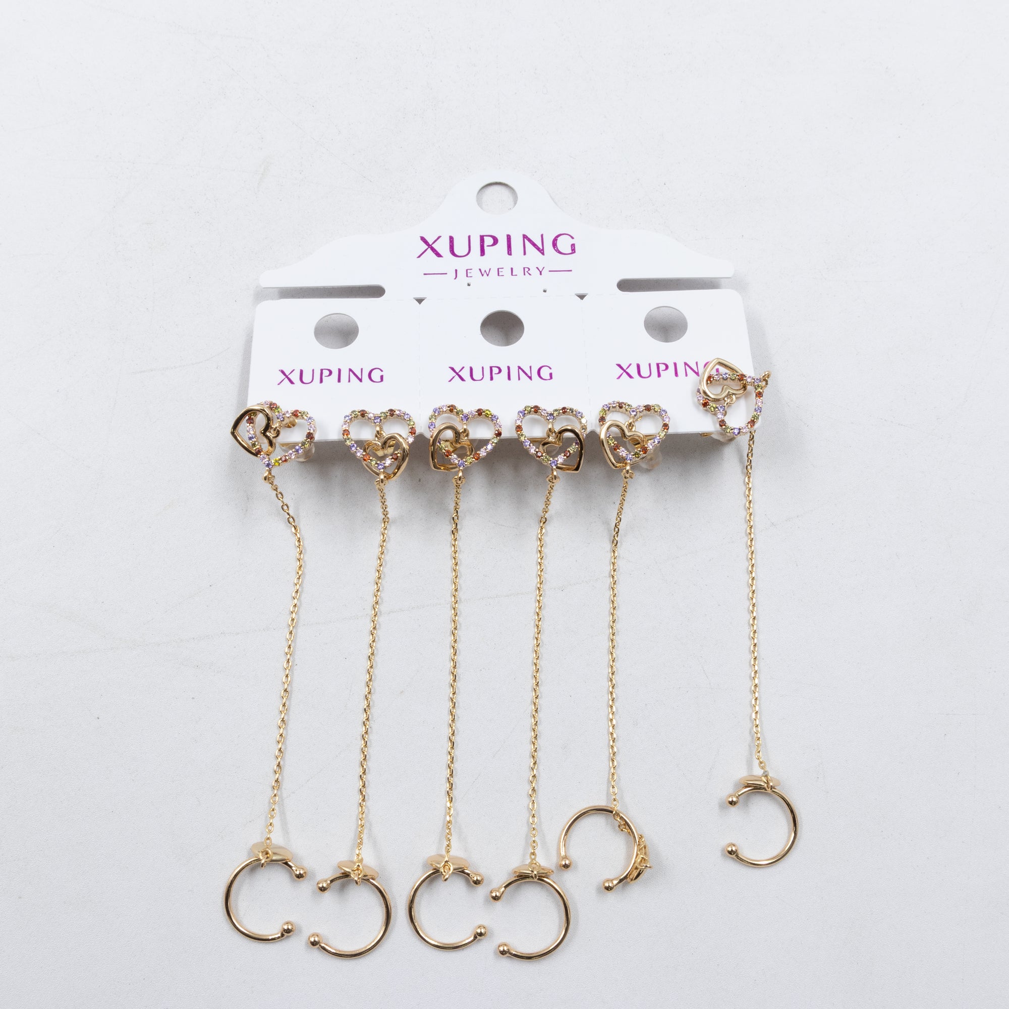 Paquete de tres pares de Aretes Dorados Xuping con piedras M5 Oro Laminado