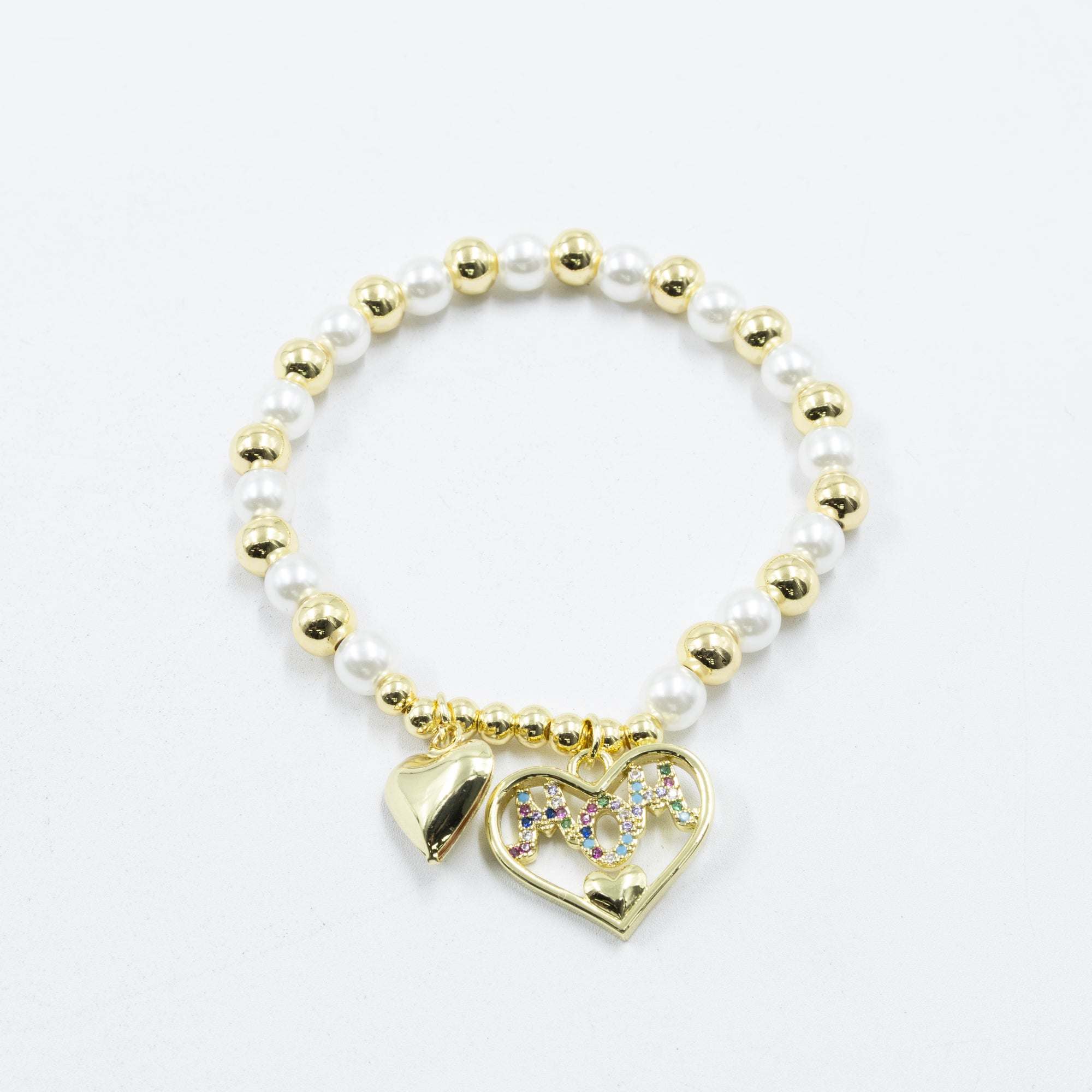 Pulsera con dije de Mamá M4 Oro Laminado 05/03/26