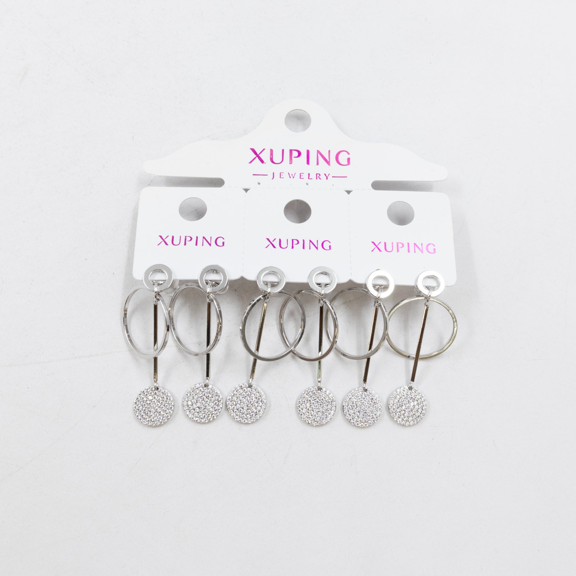 Paquete de tres pares de Aretes Plateados Xuping con piedras M2 Oro Laminado