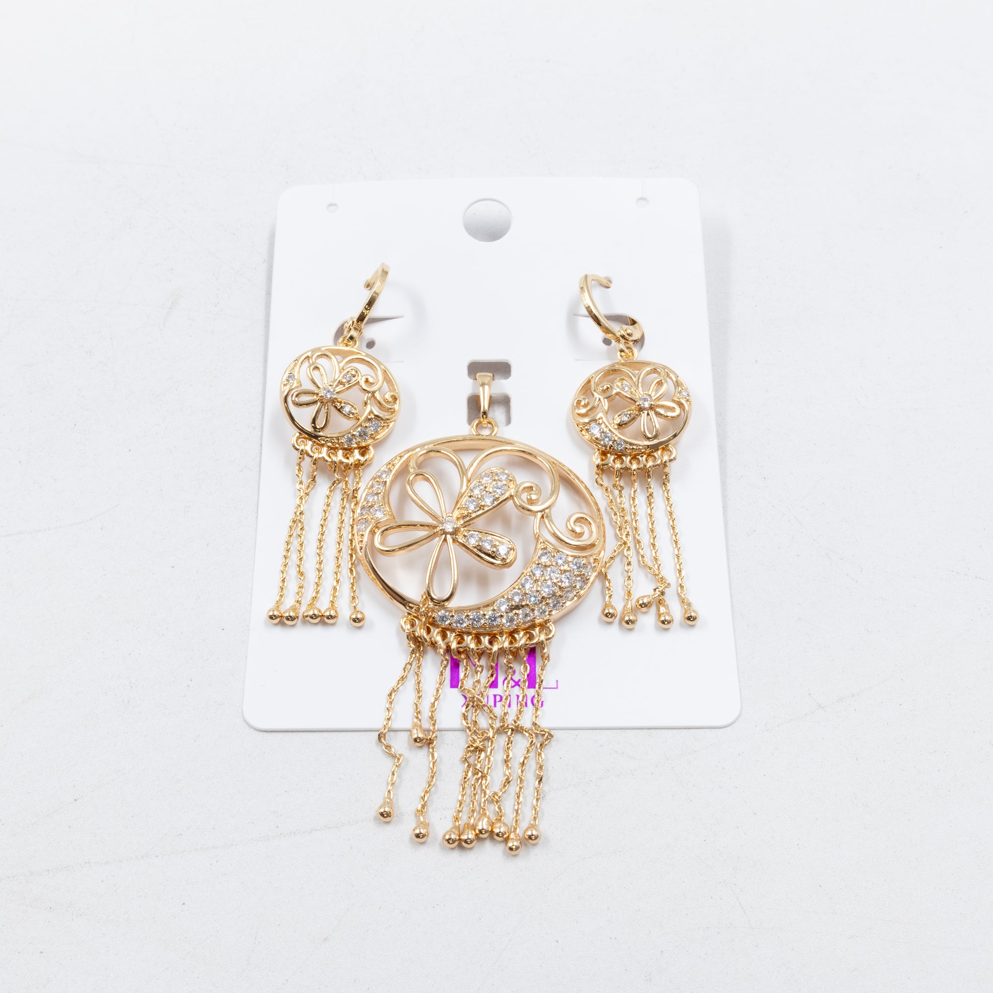 Conjunto de de Aretes y Dije M7 Oro Laminado