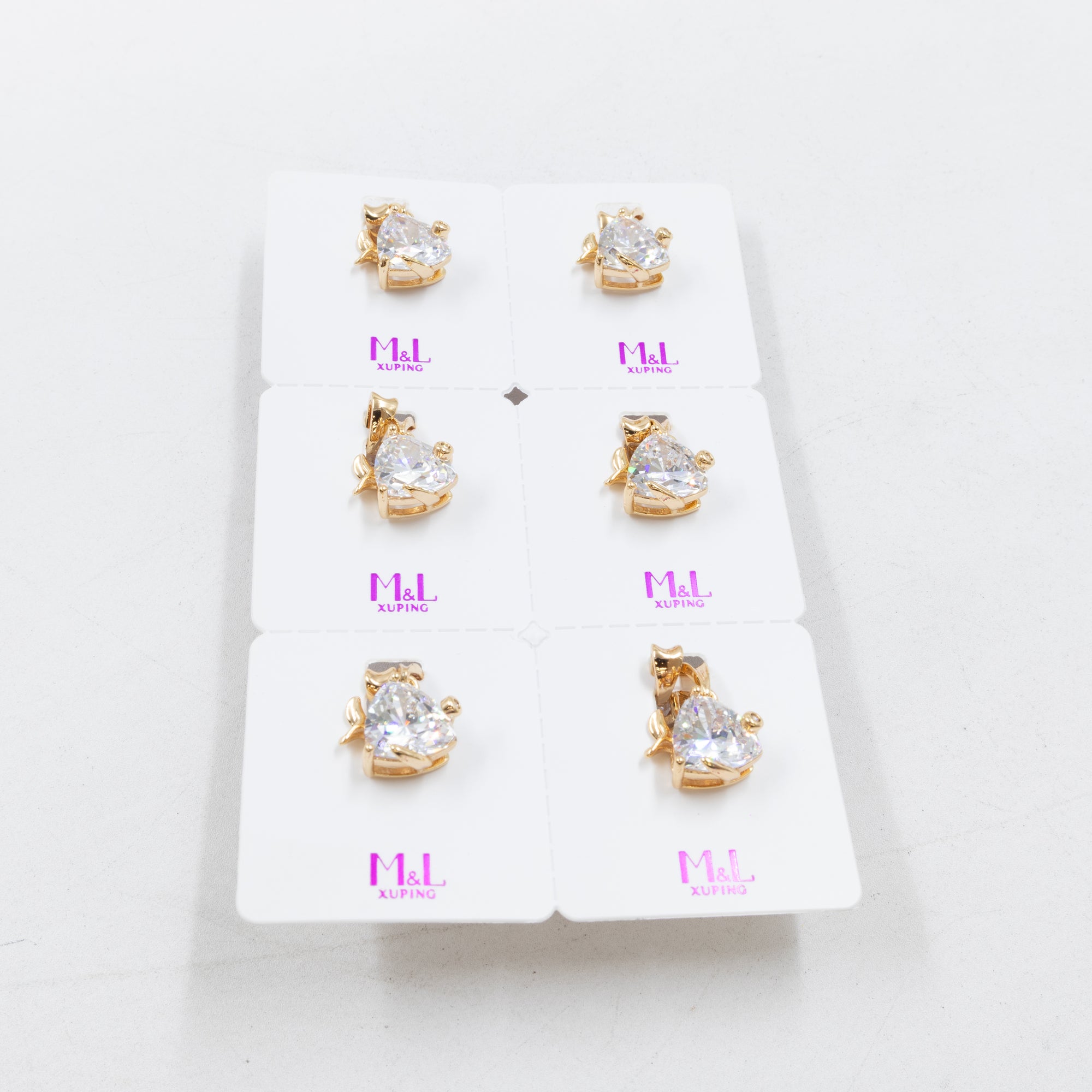 Paquete de 6 dijes con Piedras Oro Rosado  M6 Oro Laminado