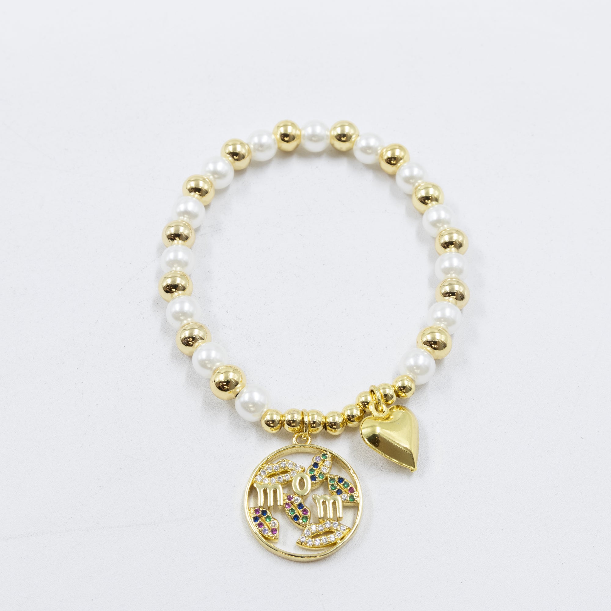 Pulsera con dije de Mamá M1 Oro Laminado 05/03/26