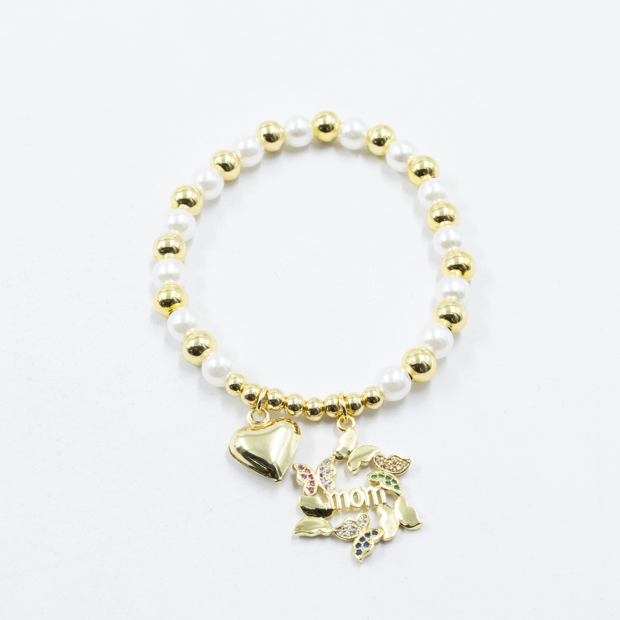 Pulsera con dije de Mamá M4 Oro Laminado 05/03/26