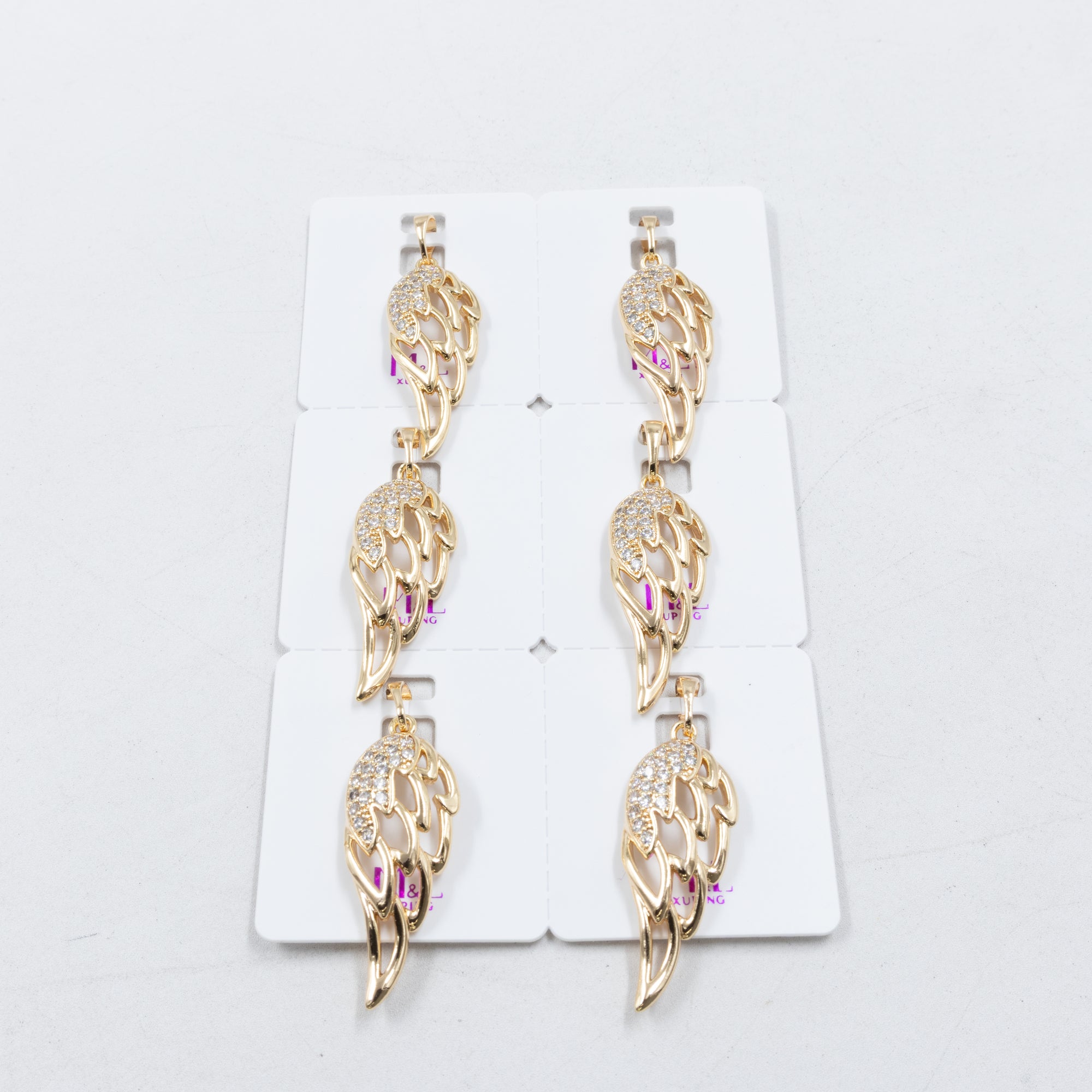 Paquete de 6 dijes con Piedras Oro Rosado  M5 Oro Laminado