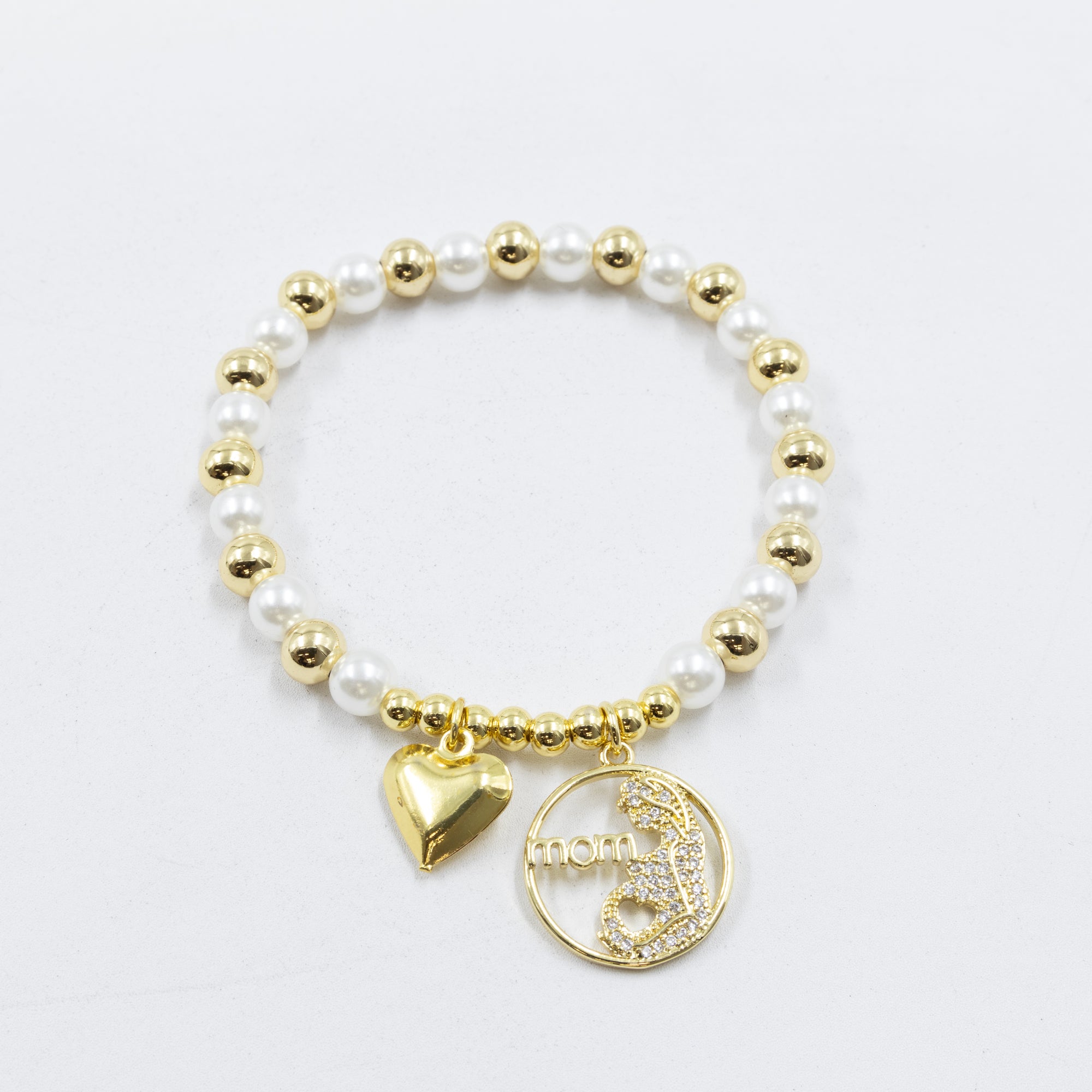 Pulsera con dije de Mamá M2 Oro Laminado 05/03/26