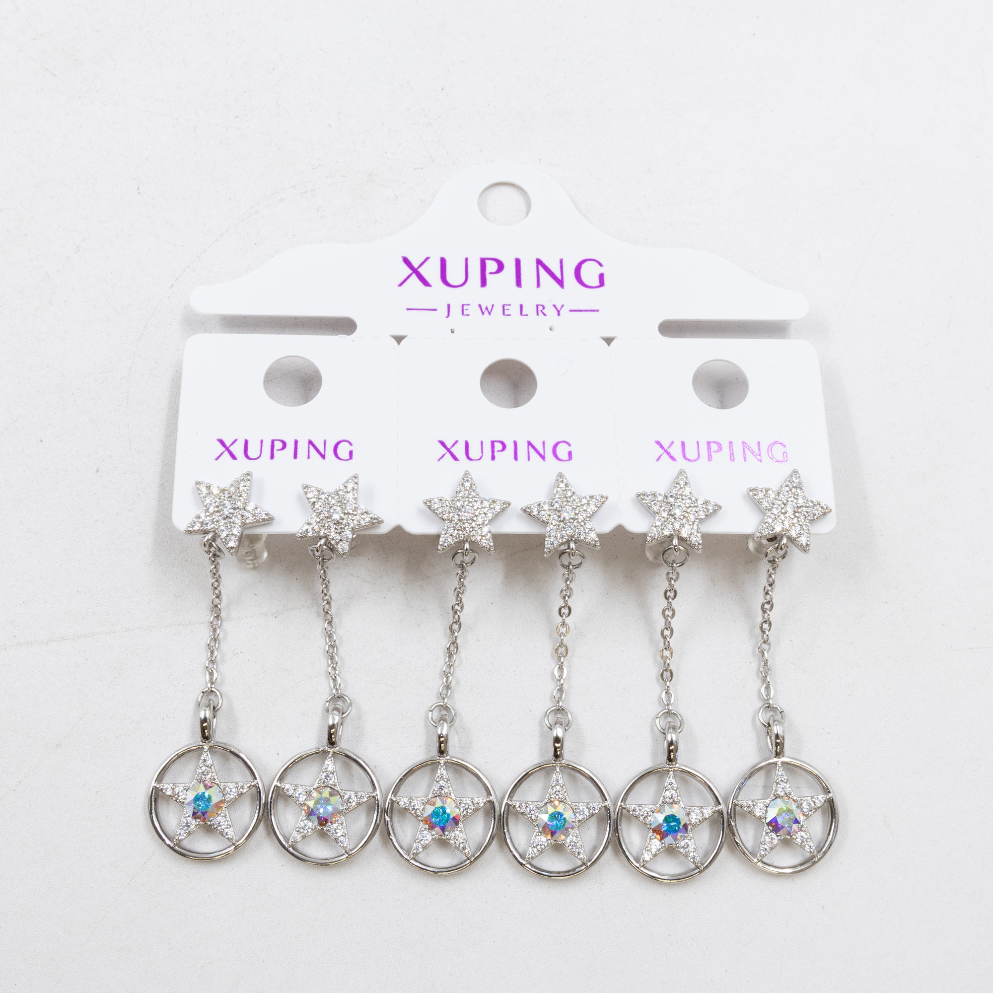 Paquete de tres pares de Aretes Plateados Xuping con piedras M2 Oro Laminado