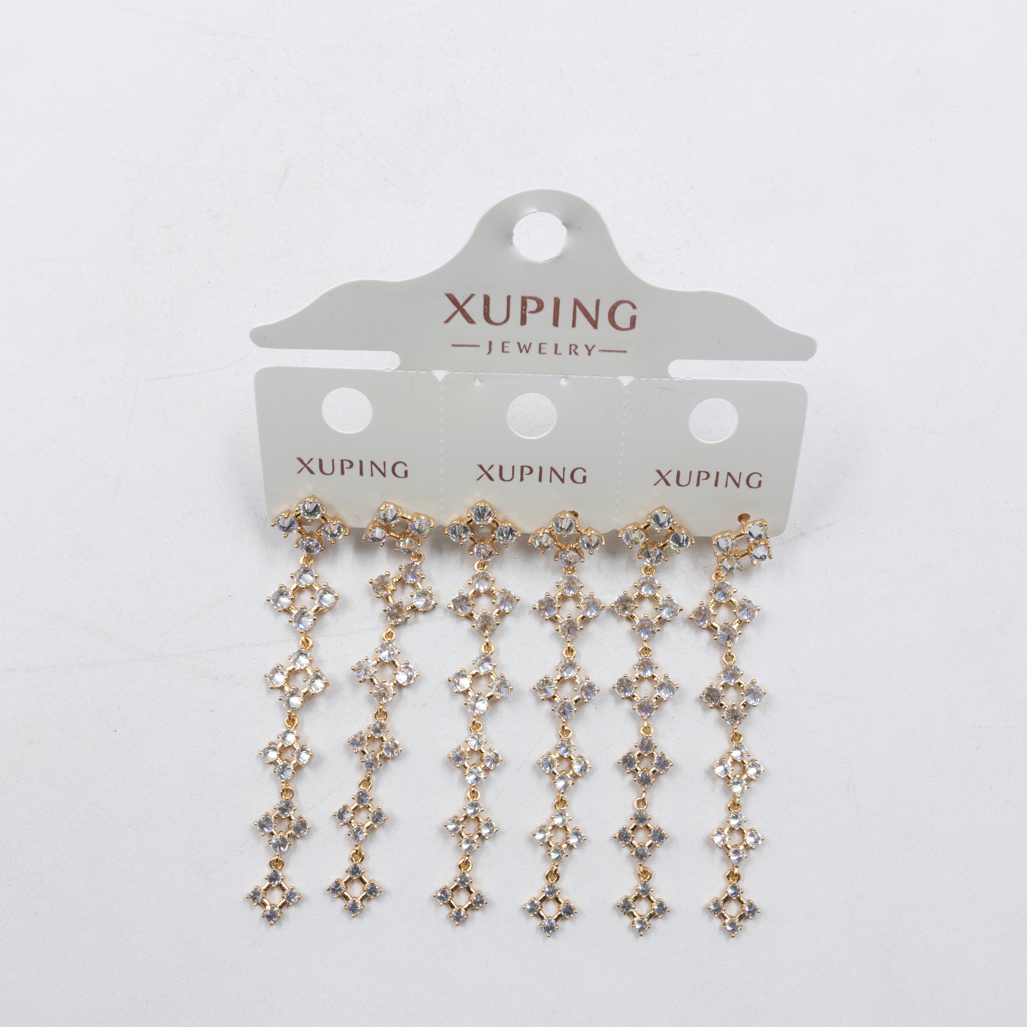 Paquete de tres pares de Aretes Dorados Xuping con piedras M5 Oro Laminado