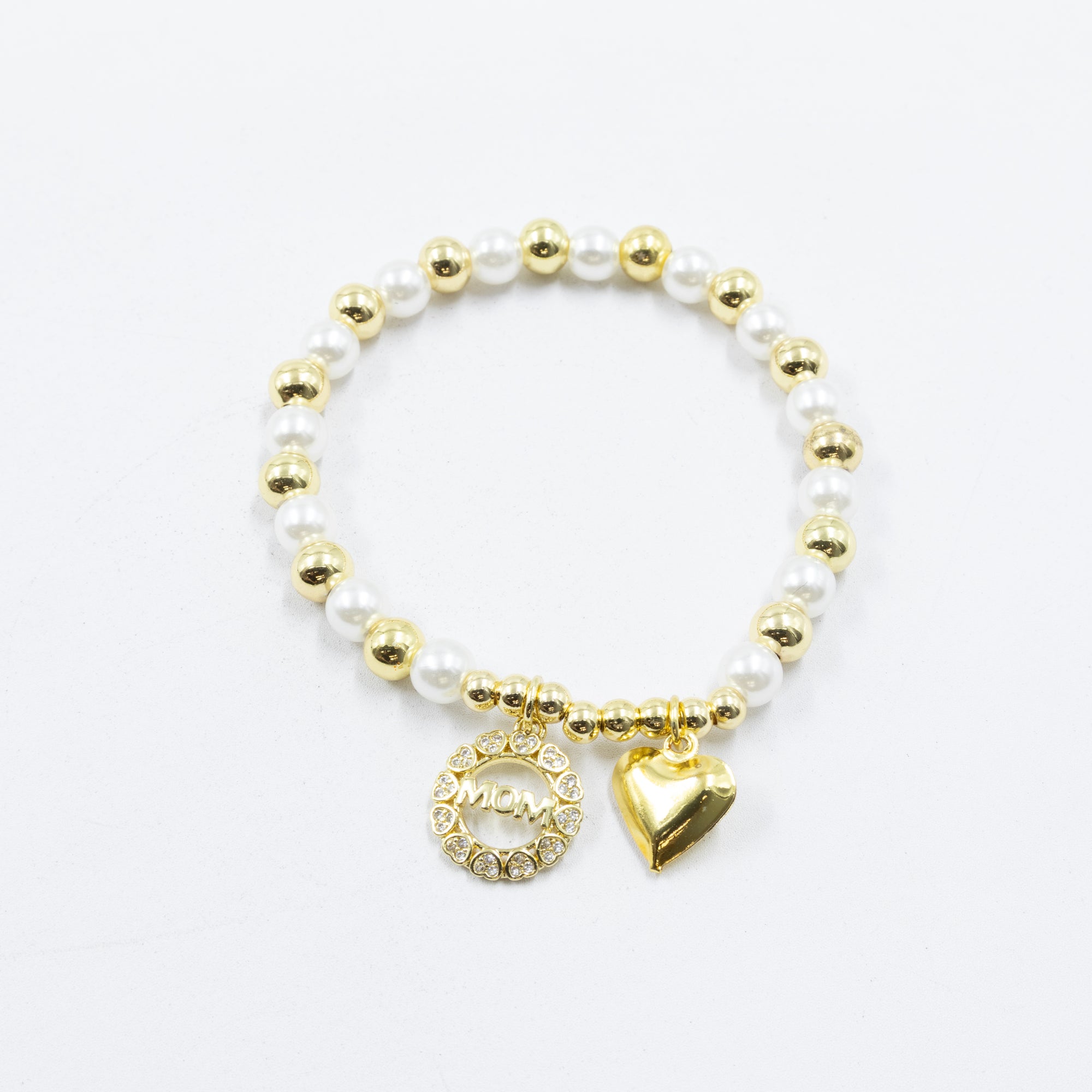 Pulsera con dije de Mamá M3 Oro Laminado 05/03/26