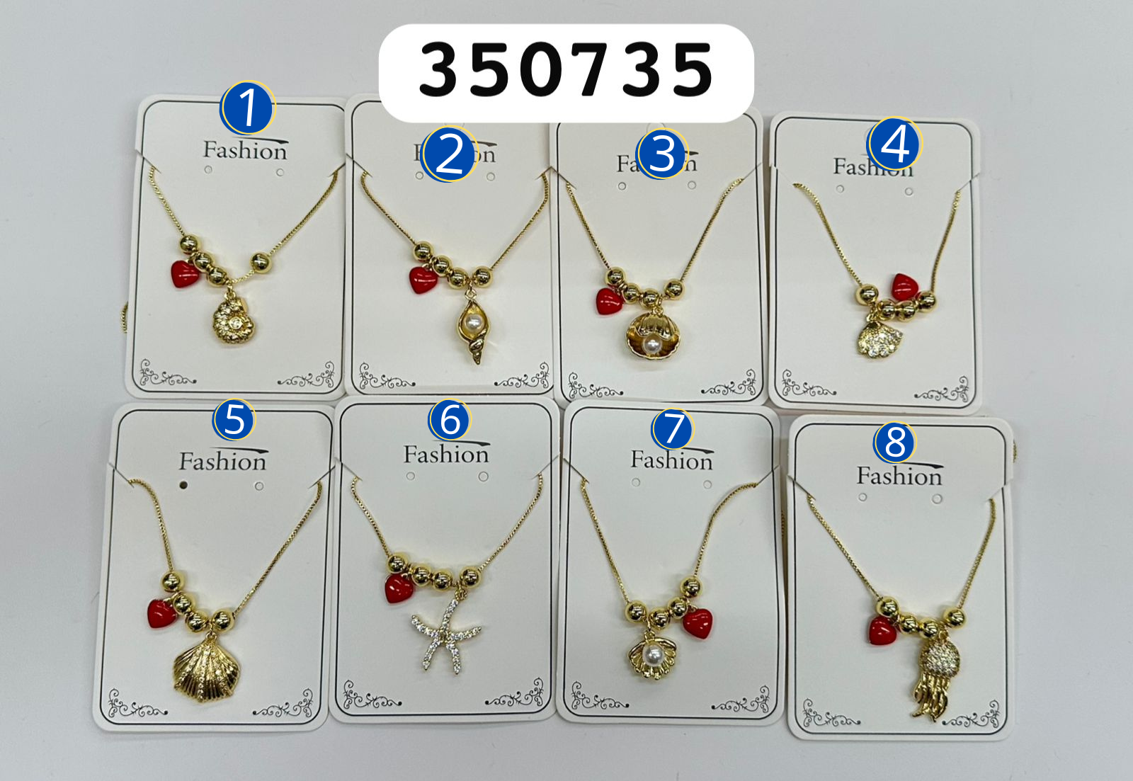 Collar Dorado con cuentas y dijes M1 Oro Laminado