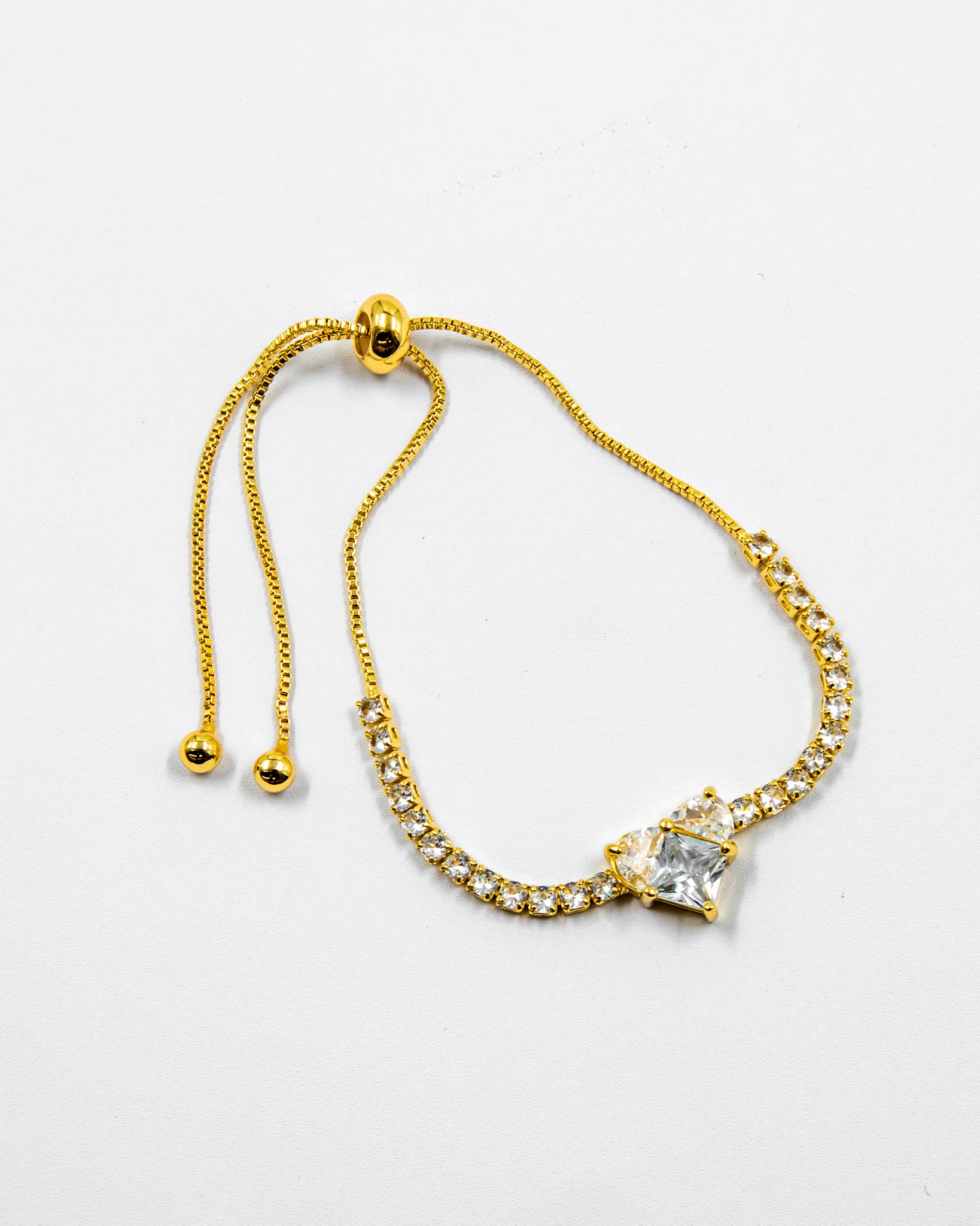 Pulsera dorada con piedras y dije de corazón - M2 Oro Laminado