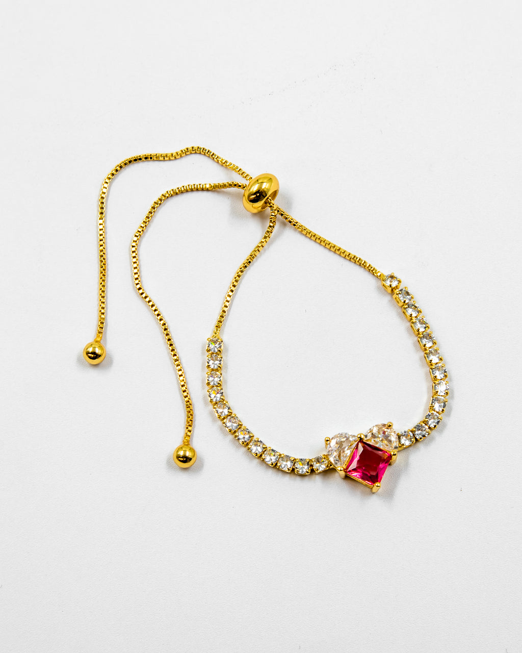 Pulsera dorada con piedras y dije de corazón - M2 Oro Laminado