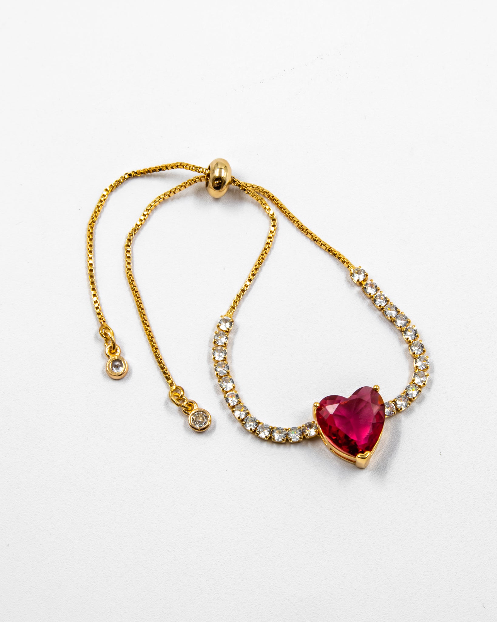Pulsera dorada con piedras y dije de corazón - M1 Oro Laminado